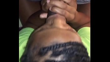 black teenie with braids gives head