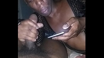 transgender princess throating fat ebony sausage while on smartphone