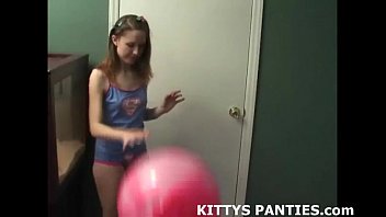 18yo kitty frolicking with a puzzle in a microskirt